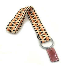 Φόρτωση εικόνας στο εργαλείο προβολής Συλλογής, Χειροποίητο μπρελόκ από υφαντό ιμάντα φάρδους 2,5cm, μεταλλικό κρίκο και ακρυλικό διακοσμητικό στοιχείο.